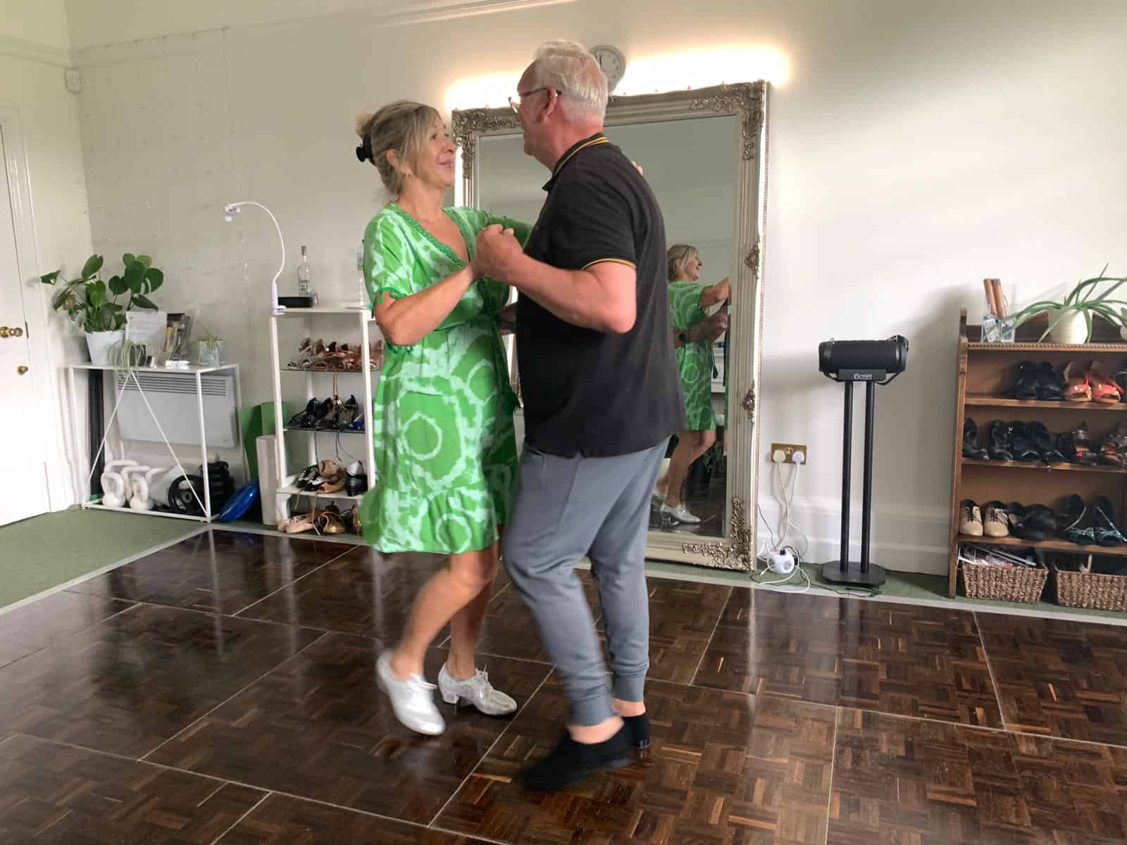 Couple dancing together in a private Salsa lesson